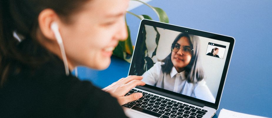 picture of a woman on video conference call with colleague 