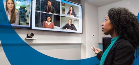 picture of a woman having a meeting with colleagues