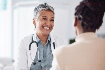 Female doctor smiling at patient
